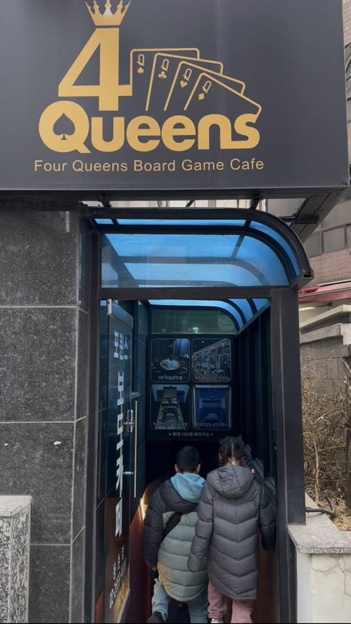 Floor seating area with tablet at a Seoul board game cafe