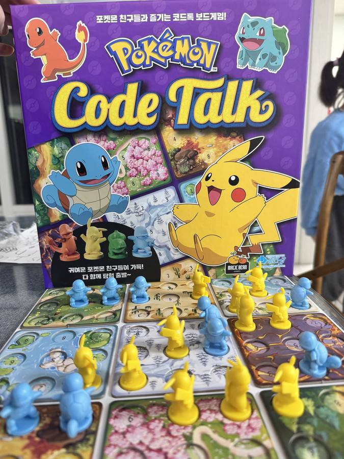 Pokemon Code Talk box and board with Pikachu and Squirtle pieces