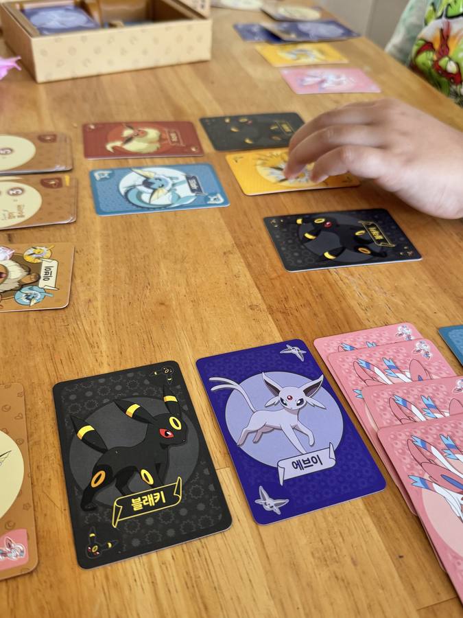Point Salad Eevee Edition cards in play showing the Eeveelutions
