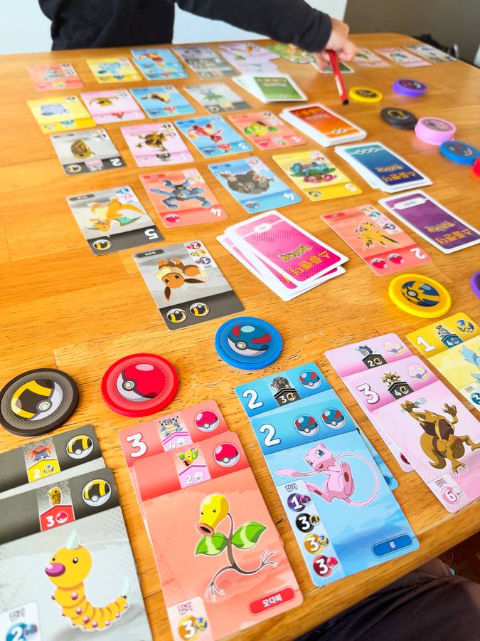 Splendor Pokemon set up mid-game with Poke Ball tokens